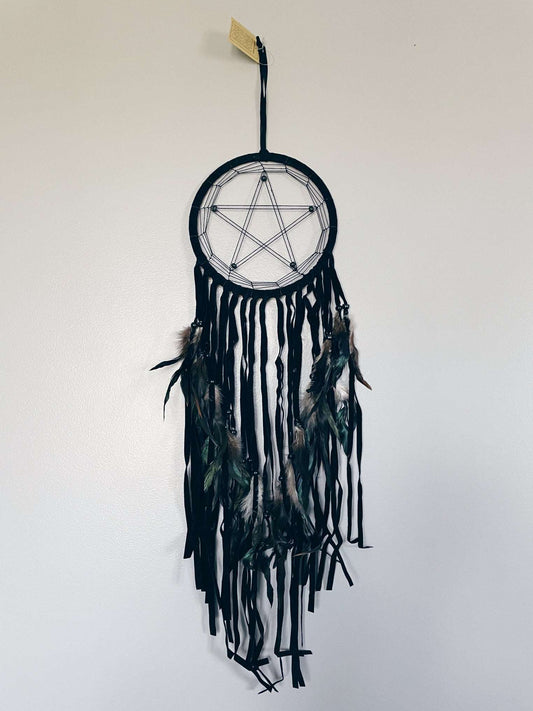 Pictured is a dreamcatcher with a pentagram in the middle. Black Pentacle/Pentagram Wall Art Wall Decor