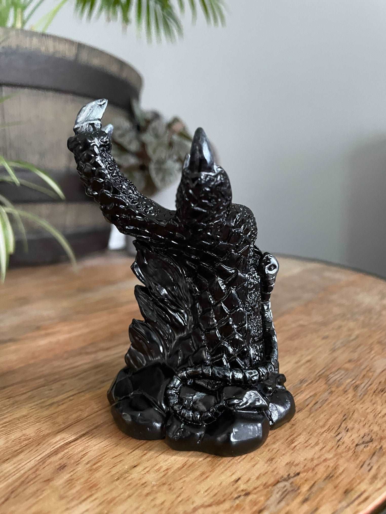 Pictured is a sphere stand in the shape of a black dragon's claw. Dragon Claw Crystal Sphere Stand - The Wandering Fox Emporium, Your Metaphysical Store side 2