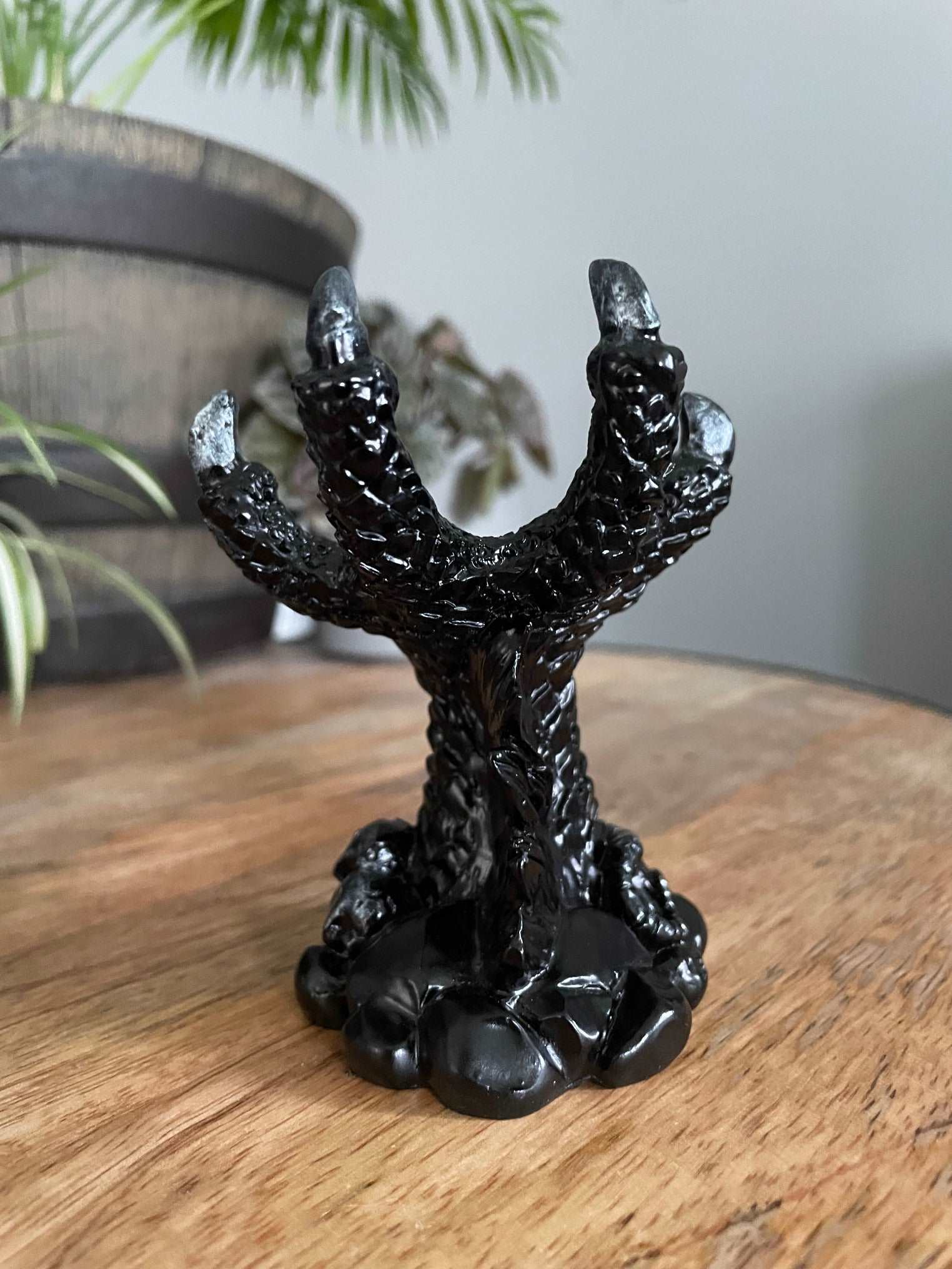 Pictured is a sphere stand in the shape of a black dragon's claw. Dragon Claw Crystal Sphere Stand - The Wandering Fox Emporium, Your Metaphysical Store back