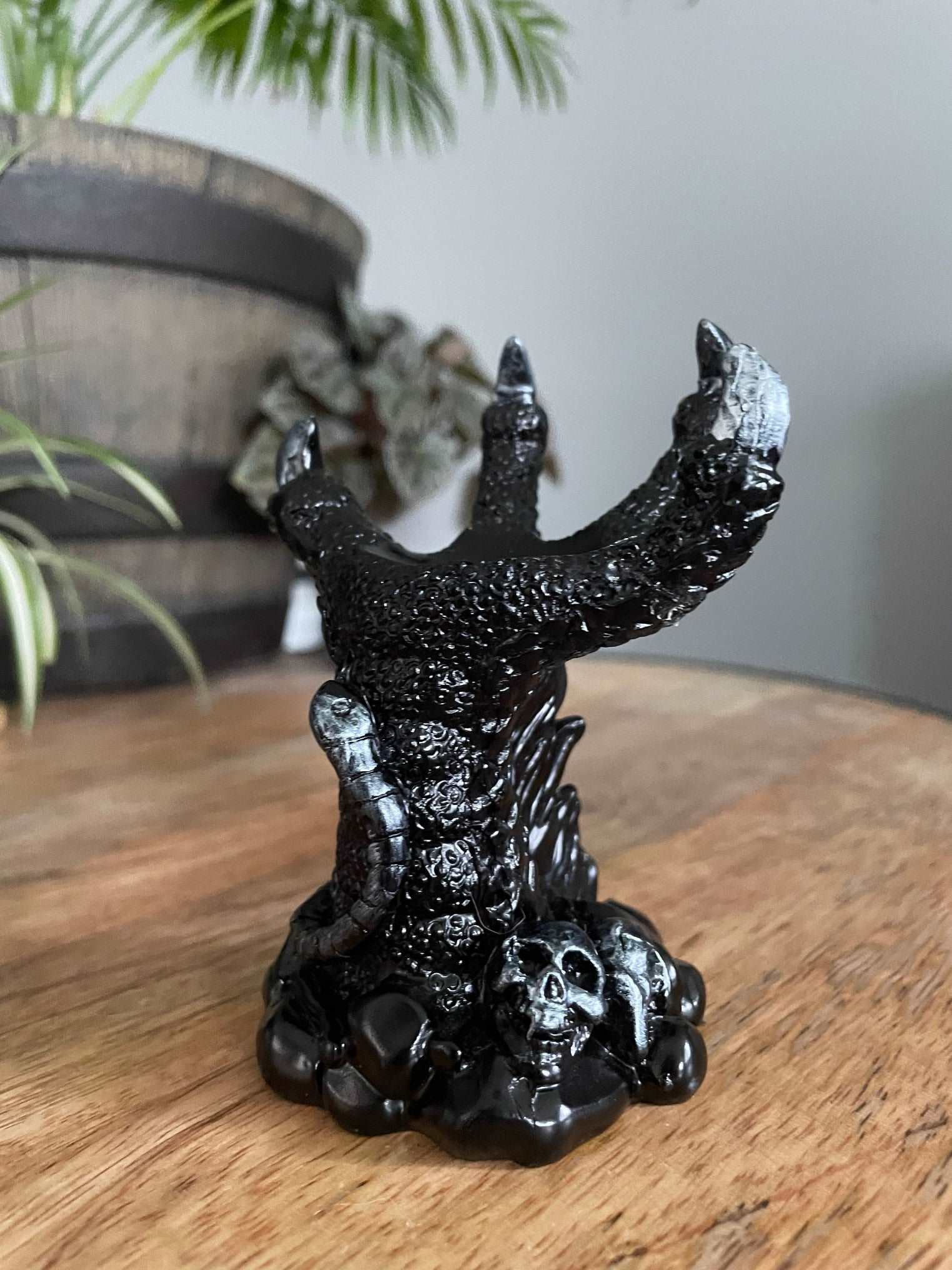 Pictured is a sphere stand in the shape of a black dragon's claw. Dragon Claw Crystal Sphere Stand - The Wandering Fox Emporium, Your Metaphysical Store side