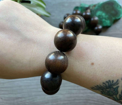 Buddhist Mala Wood Bead Bracelet (20mm) Dark Wood close up