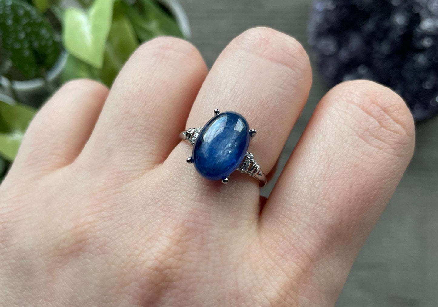 Pictured is a blue kyanite gemstone set in an S925 sterling silver ring. Blue Kyanite S925 Sterling Silver Ring (B) - The Wandering Fox Emporium, Your Crystal Store close up