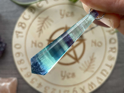 Blue Fluorite 8-Sided Crystal Pendulum (C) backlit