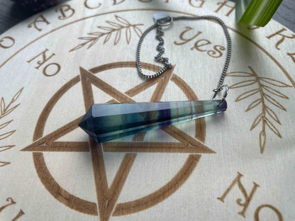 Blue Fluorite 8-Sided Crystal Pendulum (C) on board