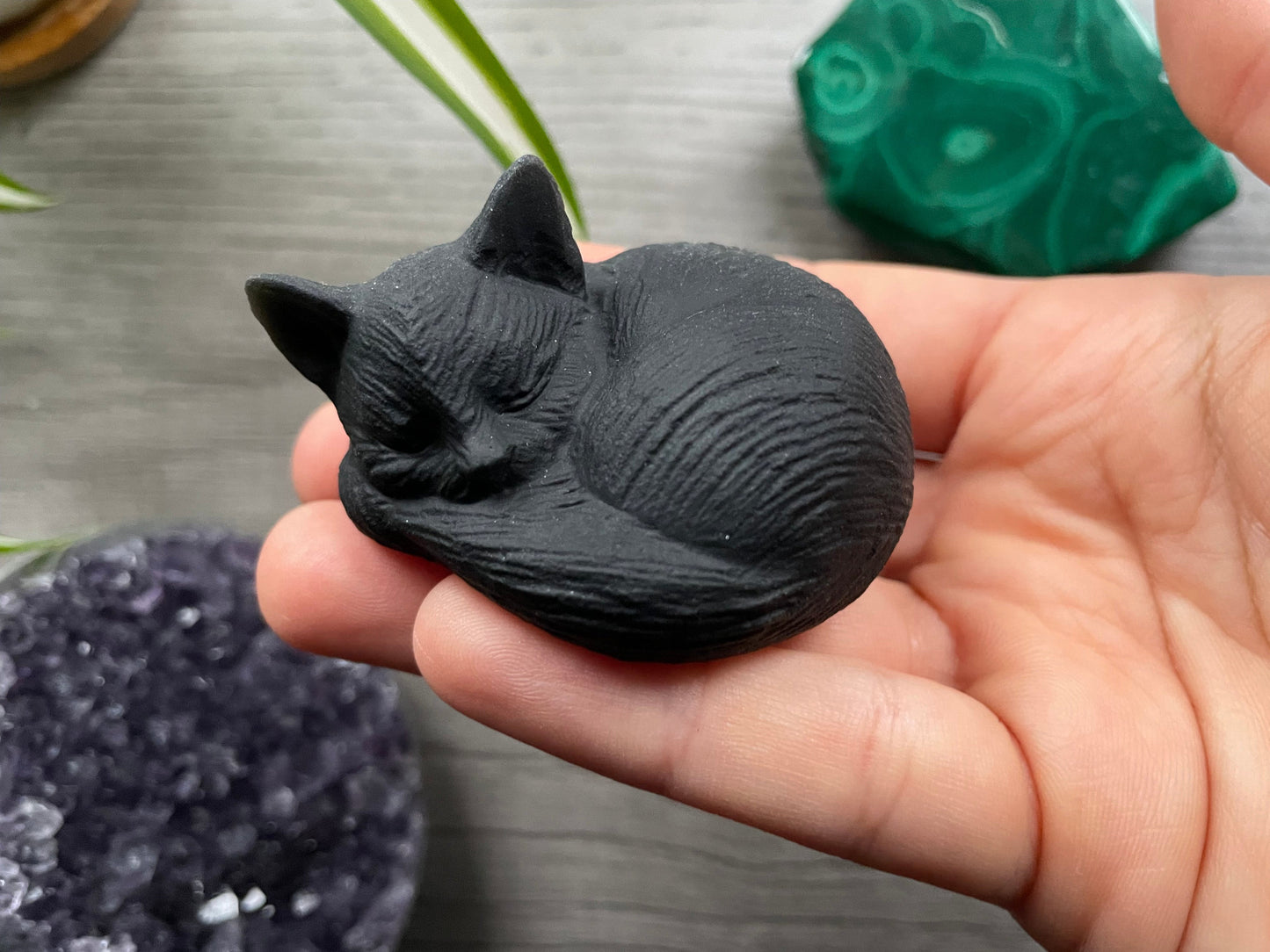 Unpolished Black Obsidian Sleeping Cat Crystal Carving close up