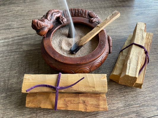 Pictured is a bundle of palo santo sticks. Palo Santo Bundle (3 sticks) 