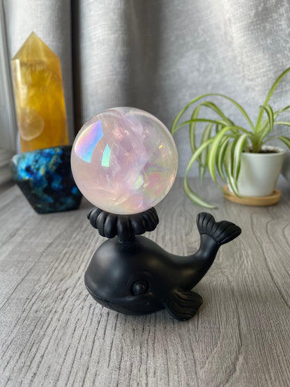 Pictured is a sphere stand in the shape of a whale. Whale Crystal Sphere Stand