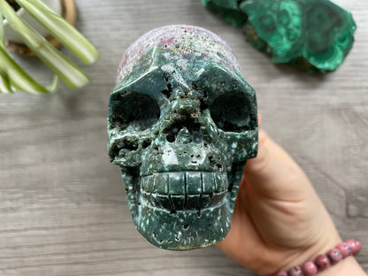 Pictured is a large skull carved out of ocean jasper or river jasper. Ocean Jasper Crystal Skull .55kg - The Wandering Fox Emporium, Your Metaphysical Store front