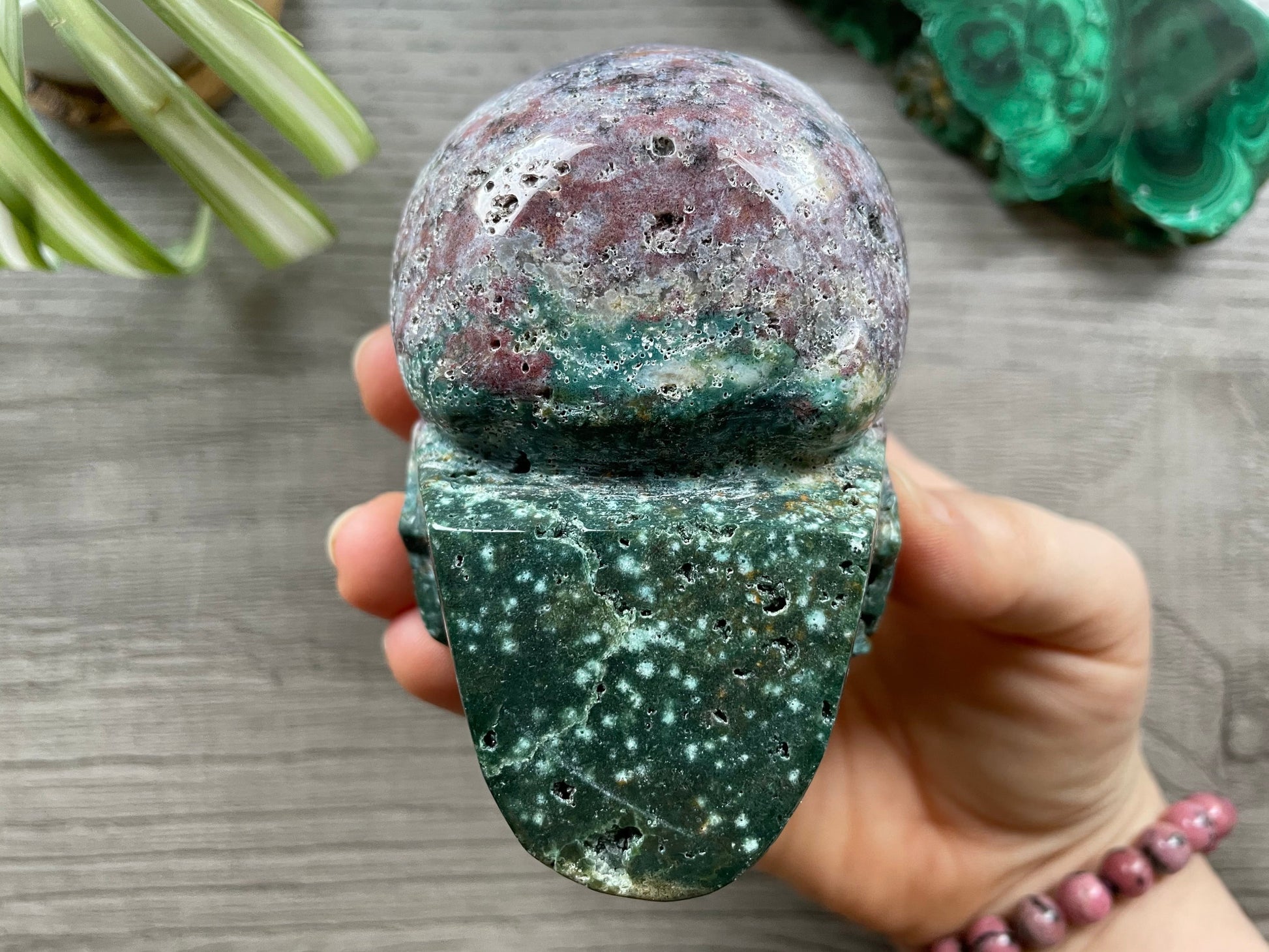 Pictured is a large skull carved out of ocean jasper or river jasper. Ocean Jasper Crystal Skull .55kg - The Wandering Fox Emporium, Your Metaphysical Store bottom