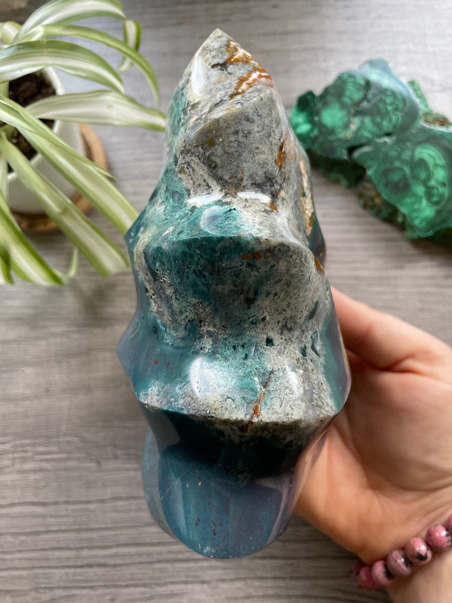 Pictured is a carved ocean jasper (river jasper) flame. Ocean Jasper Flame 1.2kg - The Wandering Fox Emporium, Your Crystal Store side