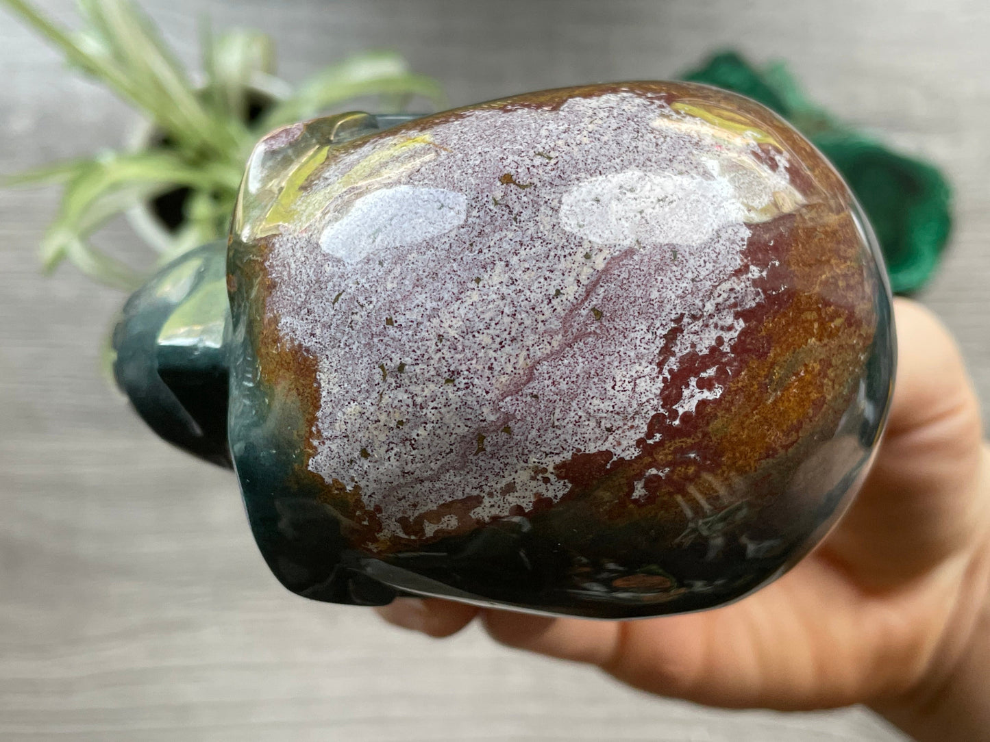 Pictured is a large skull carved out of ocean jasper or river jasper. Ocean Jasper Crystal Skull .65kg - The Wandering Fox Emporium, Your Metaphysical Store top