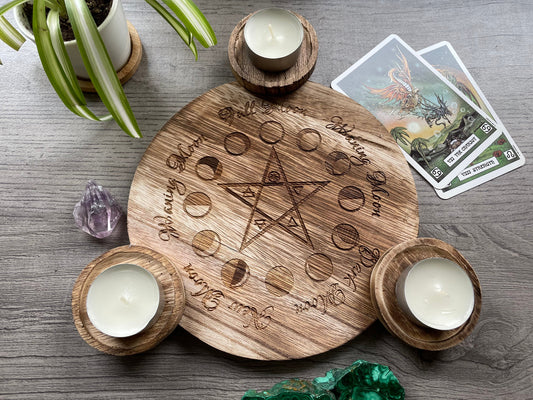 Pictured is a wood candle holder for three candles with a pentagram and the moon phases engraved on it. Moon Cycle Engraved Wooden Candle Holder