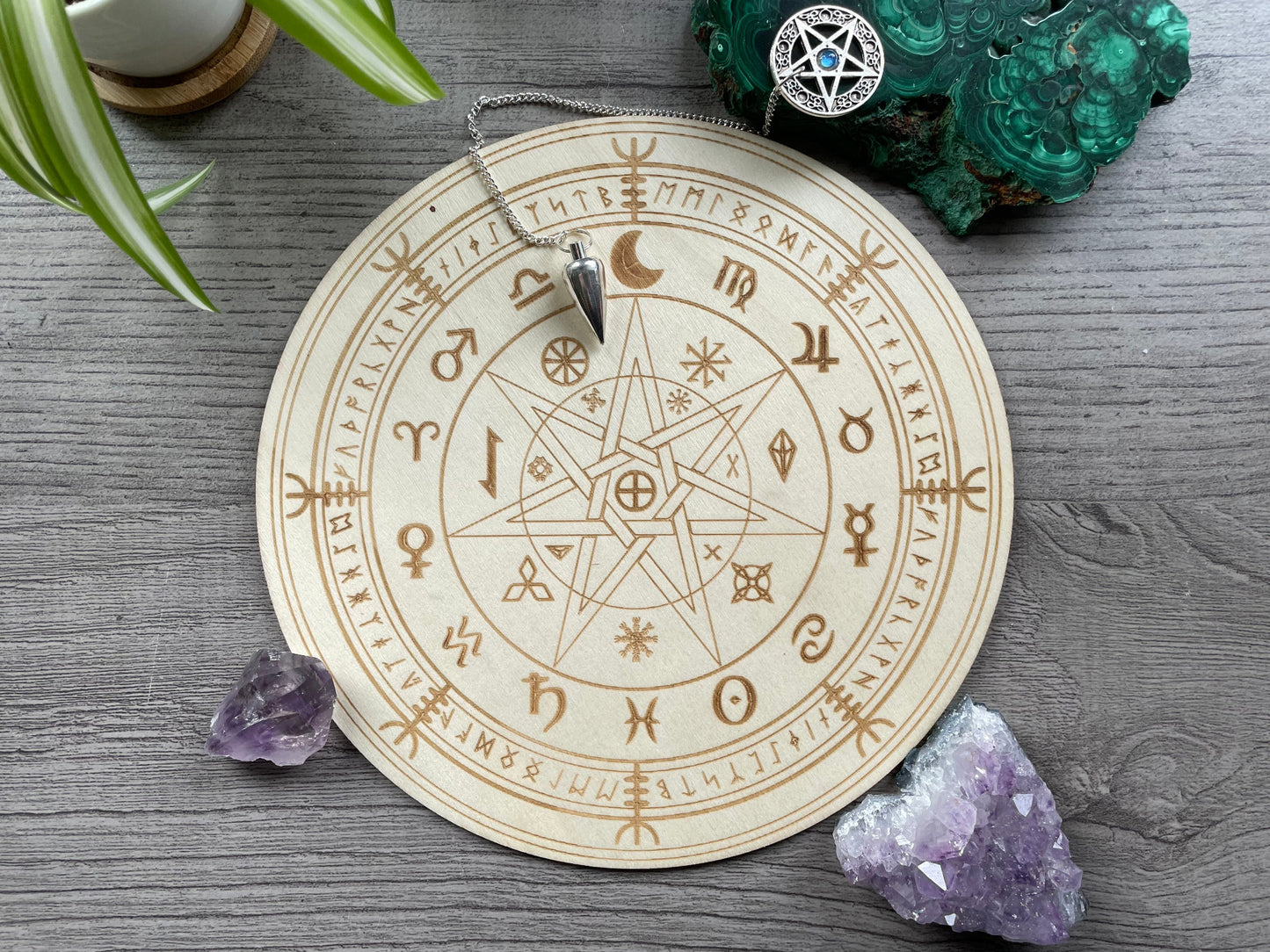 Pictured is a wood divination board. Wood Divination Board (Runes/Zodiac)