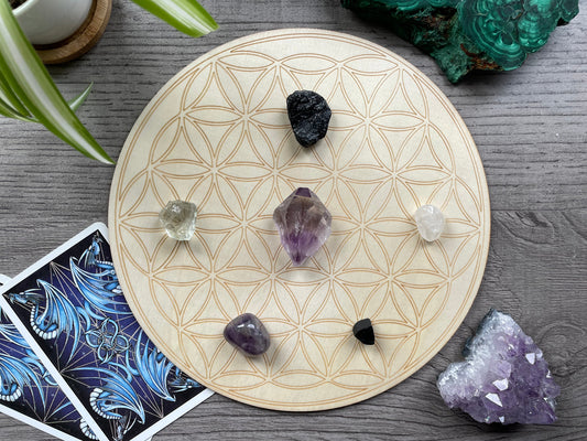 Pictured is a wood crystal grid board. Wood Flower of Life Crystal Grid 20cm