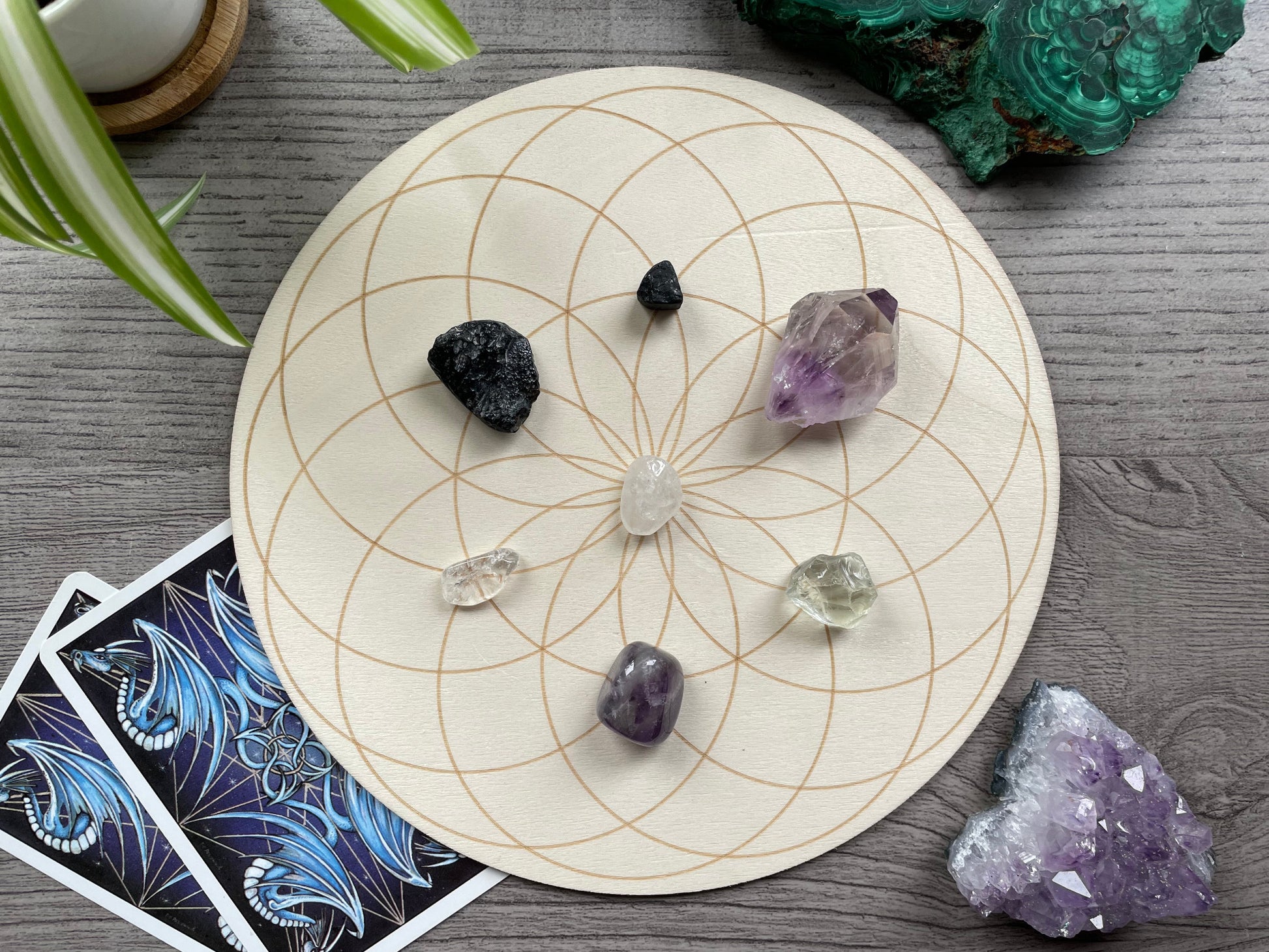 Pictured is a wood crystal grid board. Wood Seed of Life Crystal Grid 20cm