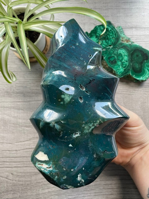 Pictured is a carved ocean jasper (river jasper) flame. Ocean Jasper Flame 1.35kg - The Wandering Fox Emporium, Your Crystal Store