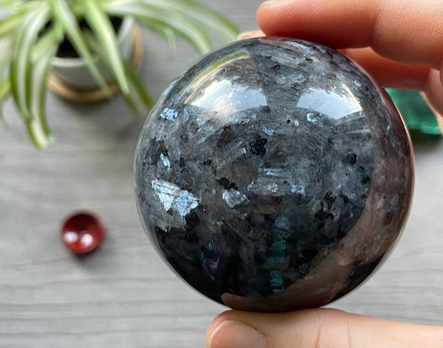 Larvikite Sphere - 64mm - The Wandering Fox Emporium, Your Crystal Store front