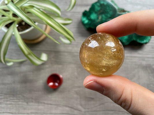 Honey Calcite Mini Sphere - 32mm (D) - The Wandering Fox Emporium, Your Crystal Store