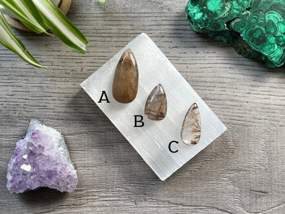 Rutilated Quartz Crystal Cabochon selection