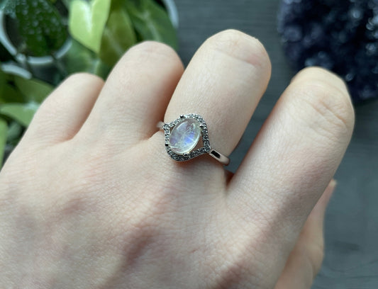 Pictured is a white moonstone gemstone set in an S925 sterling silver ring. White Moonstone S925 Sterling Silver Ring (G) - The Wandering Fox Emporium, Your Crystal Store