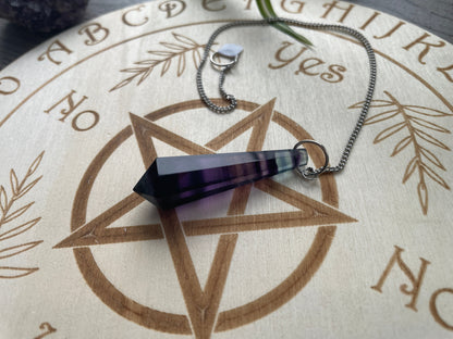 Rainbow Fluorite 8-Sided Crystal Pendulum (D) on board