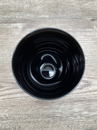 A black stemless wine glass with the words "resting witch face" written on it in white letters. The glass is on a white background. "Resting Witch Face" Stemless Wine Glass top