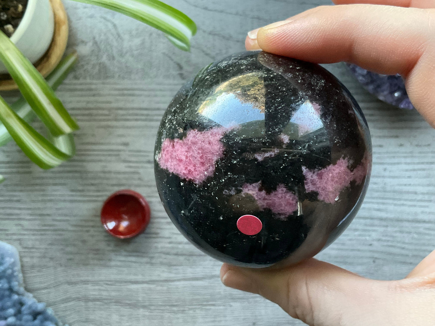 Rhodonite Sphere - 65mm - The Wandering Fox Emporium, Your Crystal Store top