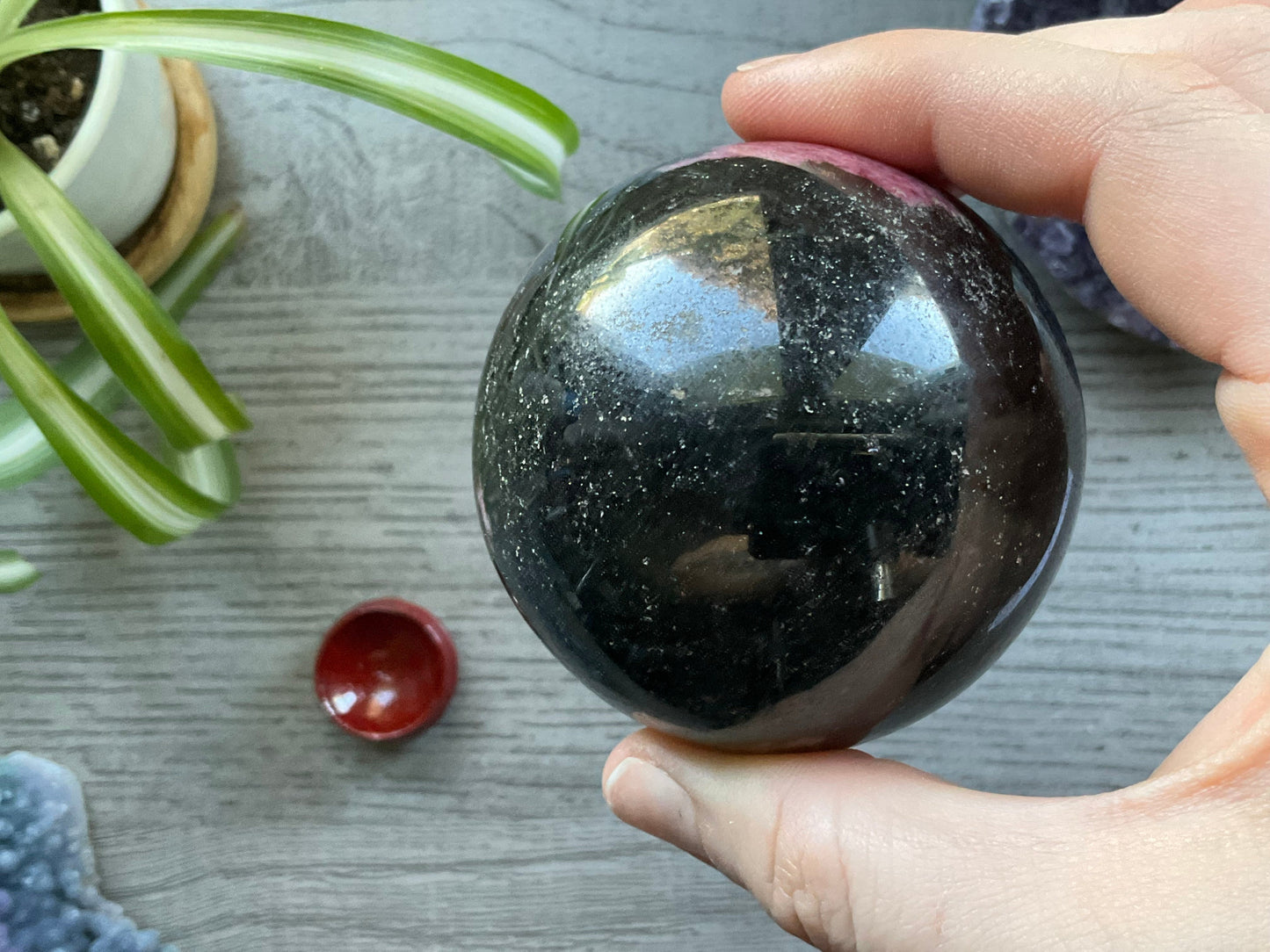 Rhodonite Sphere - 65mm - The Wandering Fox Emporium, Your Crystal Store bottom