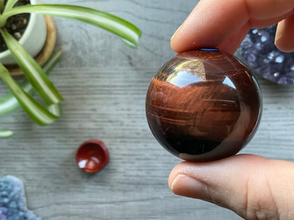 Red Tiger's Eye Crystal Sphere 37mm (B) front