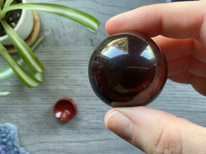 Red Tiger's Eye Sphere 37mm (D) bottom