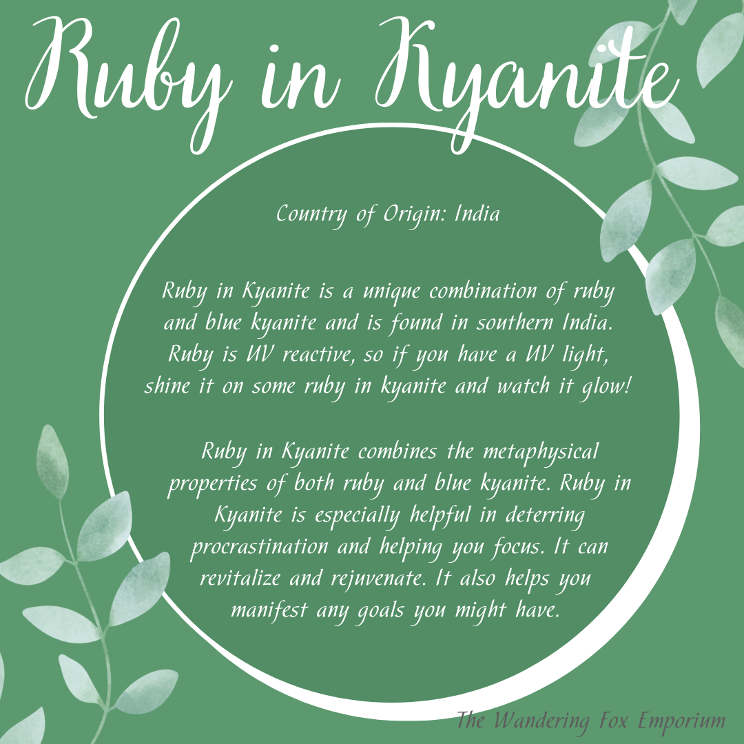 Pictured is the meaning of ruby in kyanite. Ruby in Kyanite Palm Stone - The Wandering Fox Emporium, Your Crystal Store meaning